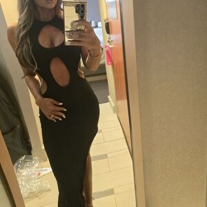 Used once stunning sexy maxi fitted dress with gold side chainsand high slit